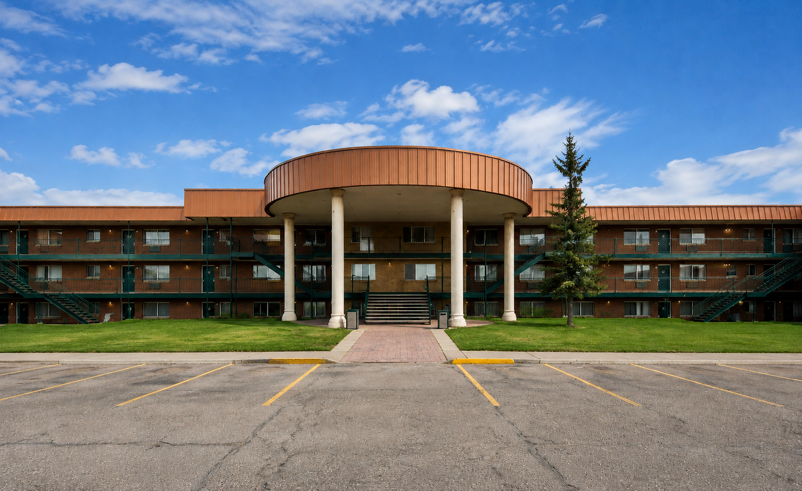 Front exterior of Sunset Suites furnished apartments in Rock Springs, Wyoming